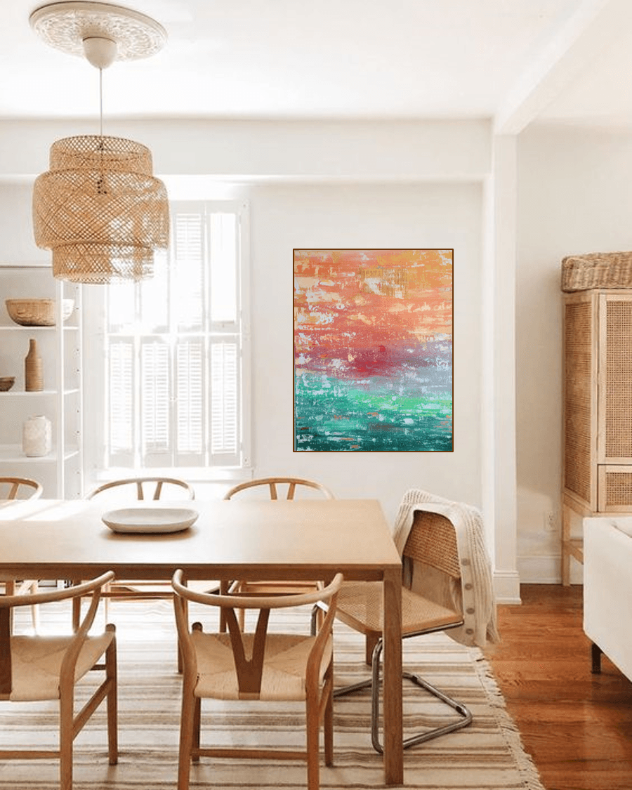 Atardeceres painting in a room overlooking the sea