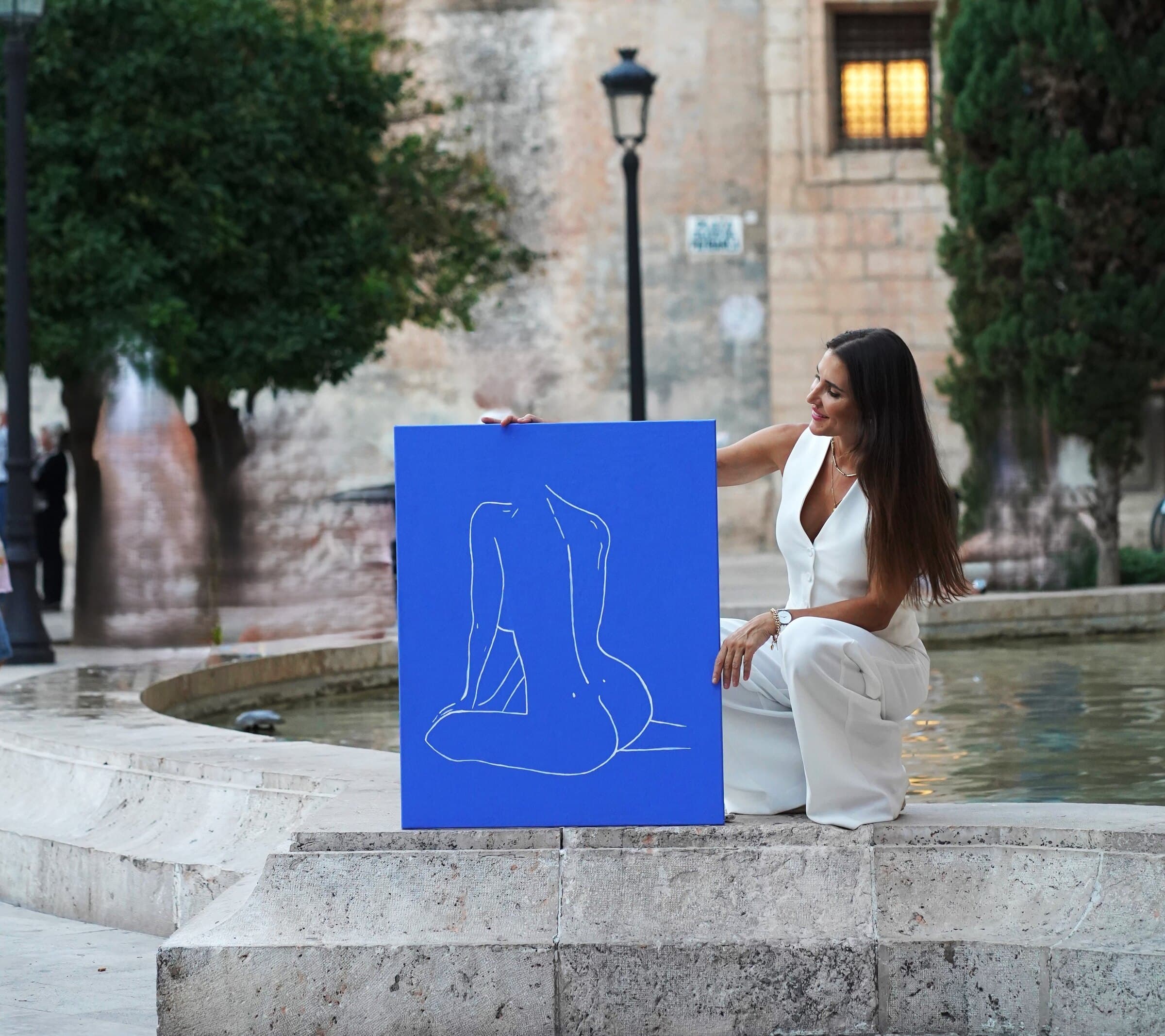 Paula de Motta with a work from Women